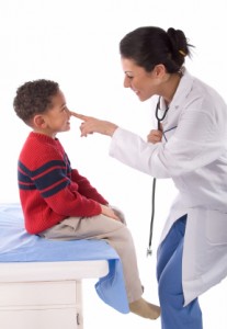 Doctor checks on kid