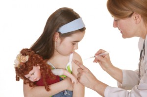 Little girl getting a shot